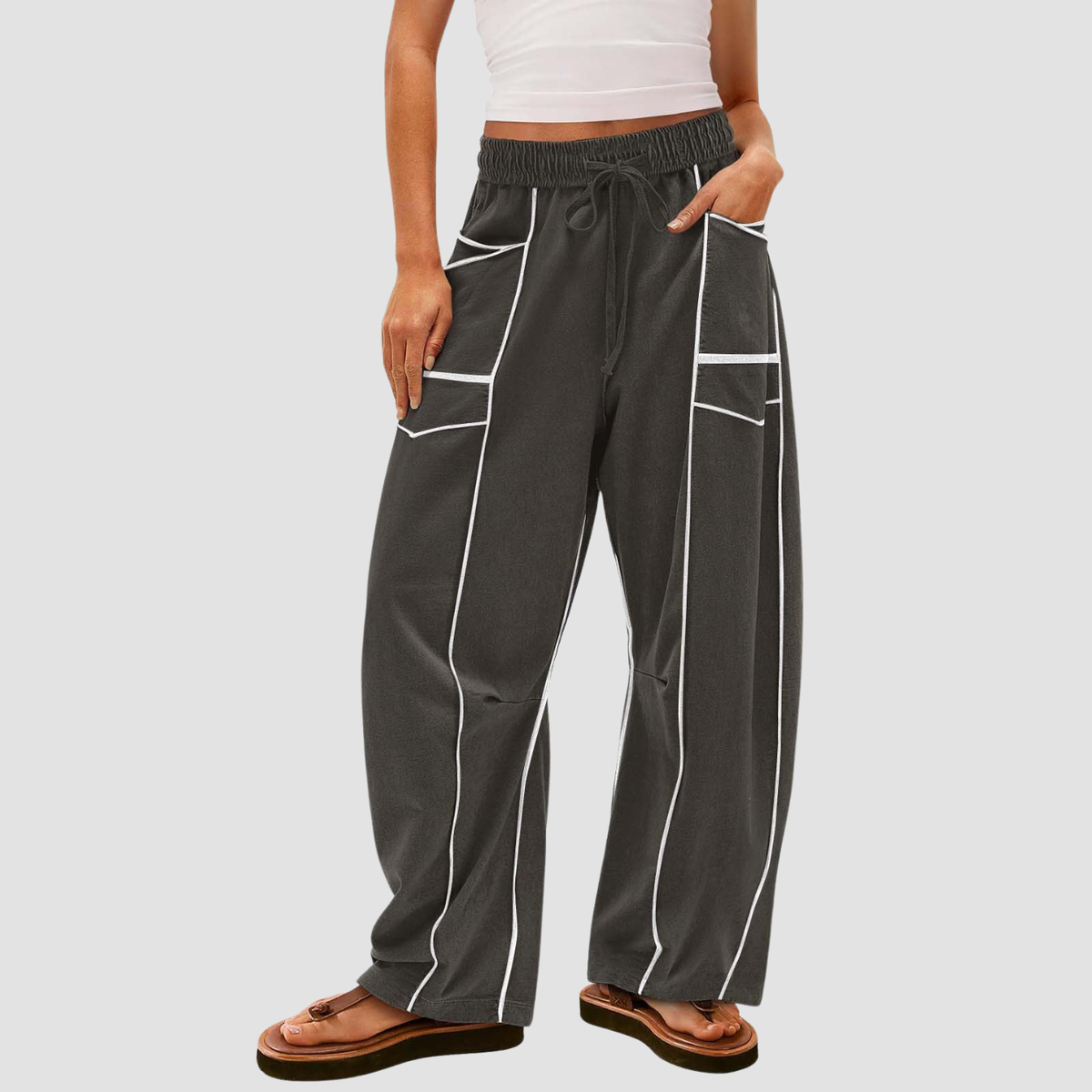 Noir | Pantaloni a gamba larga a righe