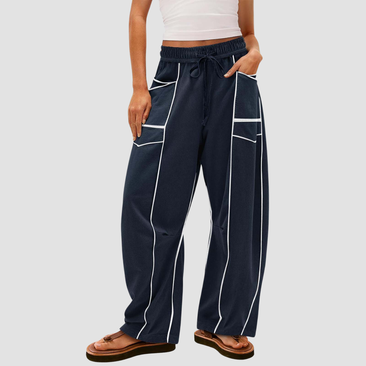 Noir | Pantaloni a gamba larga a righe