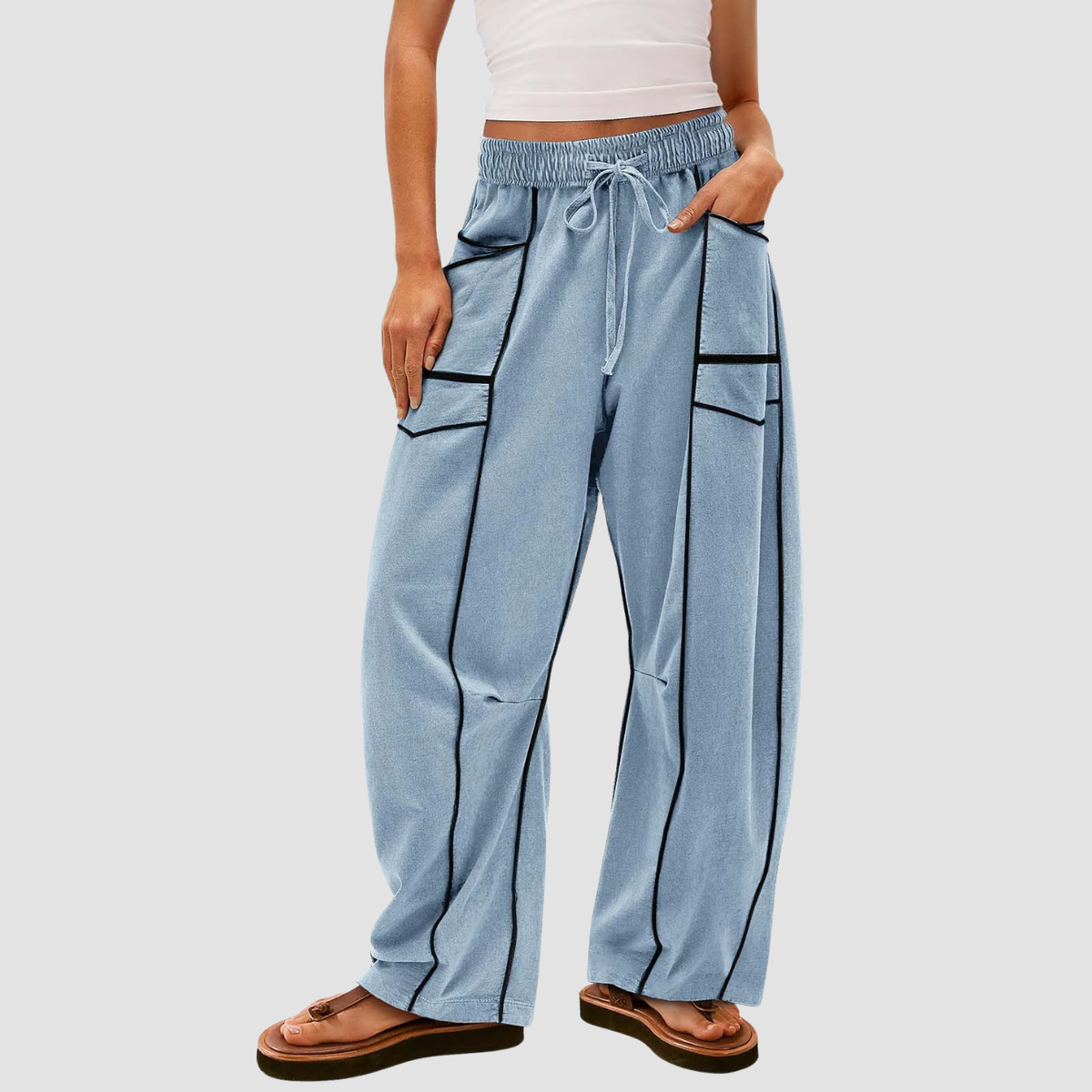 Noir | Pantaloni a gamba larga a righe
