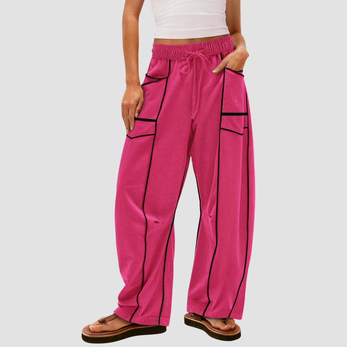 Noir | Pantaloni a gamba larga a righe