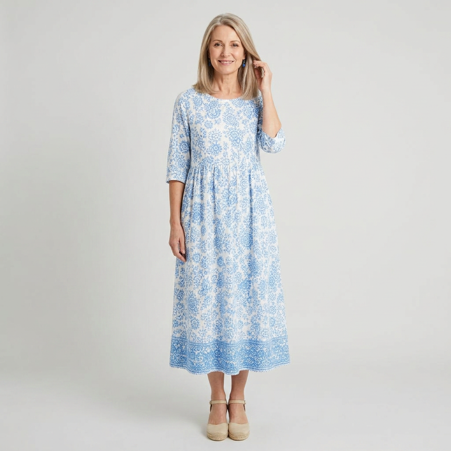 Vestido midi blanco con estampado floral azul - vista frontal